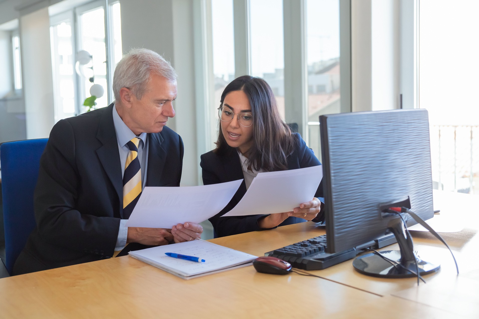 Consultant explaining document details